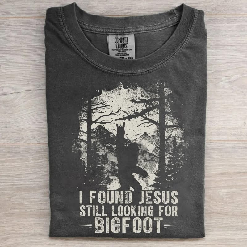 I Found Jesus Still Looking For Bigfoot T-Shirt Funny Sasquatch Merch Gift For Believers - Softandstyle